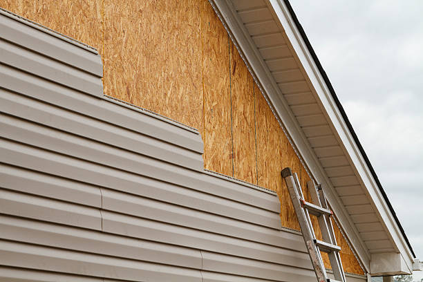 Professional Siding Contractor technician working in Greenville, NC